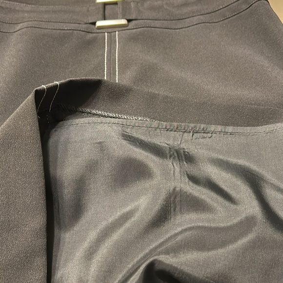 Black skirt with little buckle detail in front and white stitching. - Picture 5 of 5